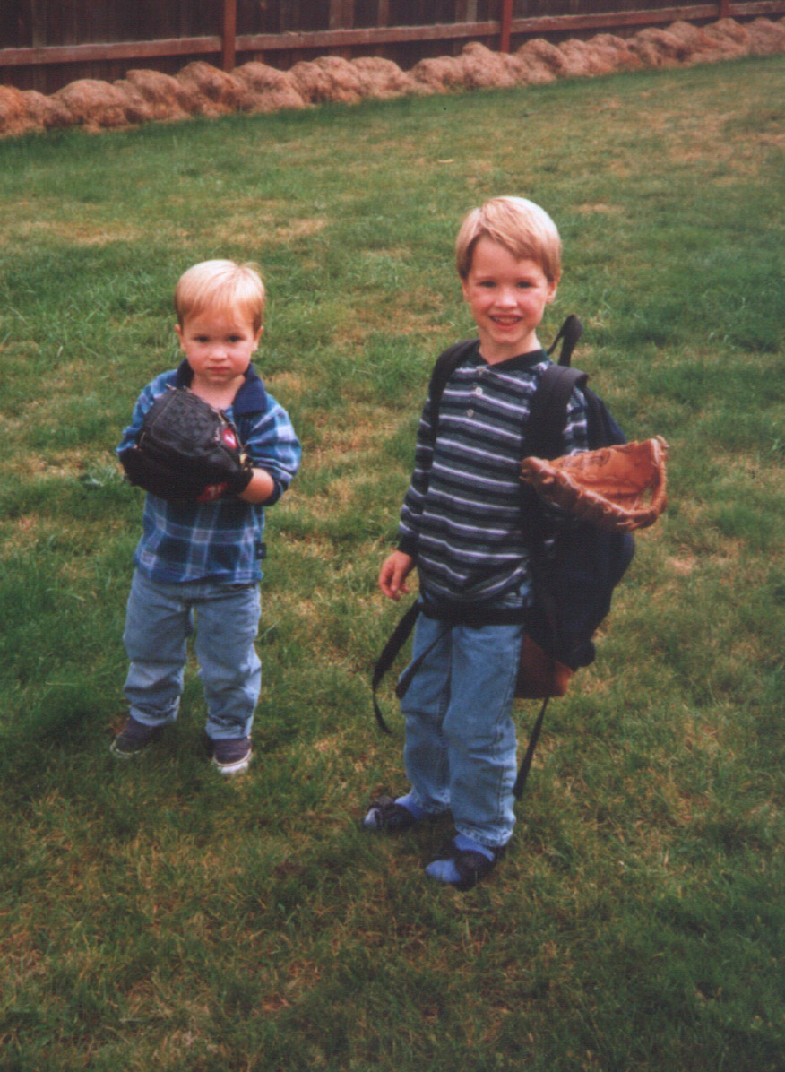 boys with baseball mits