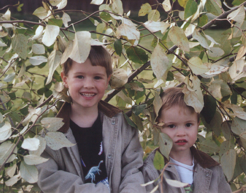 trevor & Connor in leaves